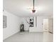 Spacious garage with sealed floor, mechanical, and electrical panel at 18916 New Passage Blvd, Land O Lakes, FL 34638