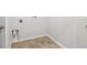 A cozy laundry room area with tile floors at 18916 New Passage Blvd, Land O Lakes, FL 34638
