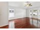 Spacious living room featuring hardwood floors and a bright bay window at 18916 New Passage Blvd, Land O Lakes, FL 34638
