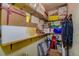 Basement area with shelves and storage space for various items and household goods at 1934 Golfview Dr # 1934, Tarpon Springs, FL 34689