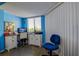 A cozy office space featuring built-in desk and cabinetry, neutral walls, and lots of natural light at 1934 Golfview Dr # 1934, Tarpon Springs, FL 34689