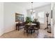 Eat-in dining room with a table for four, stylish furnishings, and bright, natural light at 19531 Mossy Oak Ct, Brooksville, FL 34601