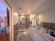 Bathroom featuring modern fixtures, tiled floors, and a large vanity at 2016 Woodward Ave, Dunedin, FL 34698