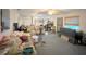 Generously sized living room area, ideal for relaxation and entertainment at 2016 Woodward Ave, Dunedin, FL 34698