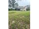View of a residential house with a screened patio at 2234 Marietta Ave, Spring Hill, FL 34608
