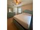 Cozy bedroom featuring a ceiling fan and light blue furniture set at 2234 Marietta Ave, Spring Hill, FL 34608
