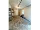 Attached garage featuring overhead lighting and extra storage space at 2234 Marietta Ave, Spring Hill, FL 34608
