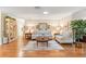 Comfortable living room featuring hardwood floors and stylish decor at 2310 Augusta Dr, Spring Hill, FL 34606
