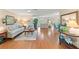 Bright and airy living room with wood floors and neutral decor at 2310 Augusta Dr, Spring Hill, FL 34606