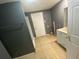 Bathroom featuring a vanity, toilet, tub, shower and neutral walls and tile flooring for a clean, modern aesthetic at 300 Midwood Dr, Plant City, FL 33566