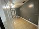 Bedroom with tile flooring, neutral walls, and a ceiling fan at 300 Midwood Dr, Plant City, FL 33566