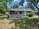 Charming single-story home featuring a well-maintained front yard and a welcoming entrance at 300 Midwood Dr, Plant City, FL 33566