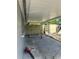 Covered patio space, perfect for outdoor entertaining and relaxation at 300 Midwood Dr, Plant City, FL 33566