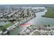 Scenic waterfront property with boat dock access, nestled in a quiet community with access to canals and the bay at 3140 Jackson Dr, Holiday, FL 34691