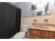 Cozy bathroom featuring classic fixtures, a shower and bathtub combination, and a vanity at 3140 Jackson Dr, Holiday, FL 34691