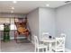 A dining room with hard surface floors, a round table, and seating for four at 3140 Jackson Dr, Holiday, FL 34691