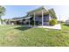 Well-maintained home exterior featuring lush green grass at 3140 Jackson Dr, Holiday, FL 34691