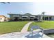 Charming home with a well-manicured lawn and access to the waterfront at 3140 Jackson Dr, Holiday, FL 34691
