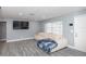 Bright living room featuring hard surface floors and contemporary furniture at 3140 Jackson Dr, Holiday, FL 34691