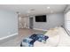 Open-concept living room features hard surface floors and modern recessed lighting at 3140 Jackson Dr, Holiday, FL 34691