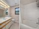 Bathroom featuring traditional fixtures and a shower at 35046 Smoketree Ln, Dade City, FL 33523
