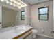 Bathroom with ample counter space and traditional fixtures at 35046 Smoketree Ln, Dade City, FL 33523