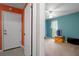 Bedroom with bright paint, ceiling fan, and natural light at 35046 Smoketree Ln, Dade City, FL 33523
