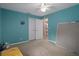 Bedroom with bright paint and carpeted floor at 35046 Smoketree Ln, Dade City, FL 33523