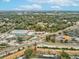 An aerial view of the property, surrounded by lush greenery and convenient road access at 3832 Sailmaker Ln # 3832, Holiday, FL 34691