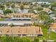 Holiday Lake Villa back patio offering a private outdoor space with lush greenery and tranquil atmosphere at 3832 Sailmaker Ln # 3832, Holiday, FL 34691