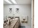 Clean bathroom with a granite vanity, sink, and decorative towels at 3832 Sailmaker Ln # 3832, Holiday, FL 34691