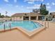 Holiday Lake Villas showing a spacious community pool with ample seating for residents to enjoy at 3832 Sailmaker Ln # 3832, Holiday, FL 34691