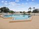 Community pool that features a diving area and plenty of space for residents to enjoy the sun at 3832 Sailmaker Ln # 3832, Holiday, FL 34691