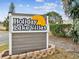 Holiday Lake Villas community sign, welcoming residents to this established neighborhood at 3832 Sailmaker Ln # 3832, Holiday, FL 34691
