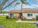 Charming single-story home with well-maintained landscaping and inviting front entrance at 3832 Sailmaker Ln # 3832, Holiday, FL 34691