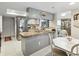 Modern kitchen with stainless steel appliances, granite countertops, and ample cabinet space at 3832 Sailmaker Ln # 3832, Holiday, FL 34691