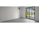 Basement with a sliding glass door providing natural light and access to the exterior at 4048 Bluefish Dr, Hernando Beach, FL 34607