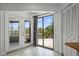Access to lanai from this area with tiled floors and lots of natural light at 4048 Bluefish Dr, Hernando Beach, FL 34607