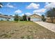 Charming single-story home with an attached two-car garage and a brick-paved driveway at 4072 Everett Ave, Spring Hill, FL 34609