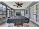 Bright sun room featuring a large pool table and expansive windows offering plenty of natural light at 4072 Everett Ave, Spring Hill, FL 34609