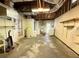 Unfinished basement with utilities, laundry area, and storage space at 4142 Crestfield Ave, Holiday, FL 34691
