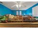 Large Bonus Room featuring blue walls and a model train city at 4350 Sawgrass Blvd, New Port Richey, FL 34653