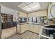 Open concept kitchen featuring modern appliances, lots of counter space, and natural lighting at 4350 Sawgrass Blvd, New Port Richey, FL 34653