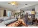 Open-concept living room flowing into the kitchen and dining areas, great for gatherings and modern living at 4350 Sawgrass Blvd, New Port Richey, FL 34653