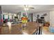 Open living space showcasing a blend of dining, living, and office areas, ideal for flexible living at 4350 Sawgrass Blvd, New Port Richey, FL 34653