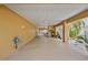 Spacious covered carport with ample space, stairs, and access to the home at 4460 Flounder Dr, Hernando Beach, FL 34607