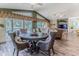 Dining area features a stylish table and chairs set with scenic outdoor views at 4460 Flounder Dr, Hernando Beach, FL 34607