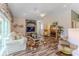 Living room showcases a fireplace, media center, comfortable seating and outdoor access at 4460 Flounder Dr, Hernando Beach, FL 34607