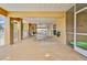 Outdoor patio offers ample space for dining and relaxation with views of the pool and backyard; ideal for entertaining at 4460 Flounder Dr, Hernando Beach, FL 34607