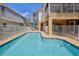 Outdoor pool with patio space perfect for relaxation and leisure with views of the waterfront property at 4460 Flounder Dr, Hernando Beach, FL 34607